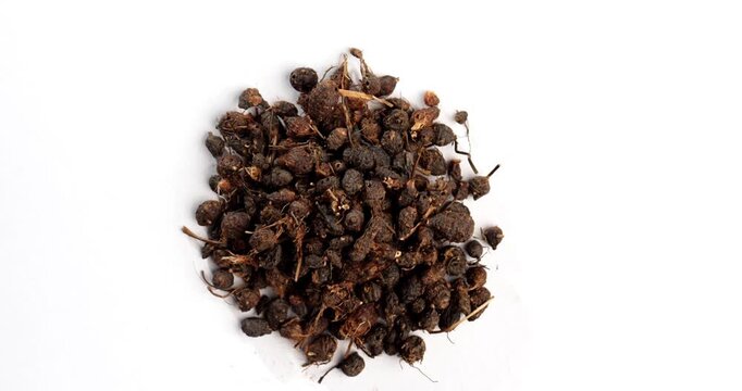 Ayurvedic Nagarmotha - Cyperus Scariosus or Cypriol in a bowl or heap