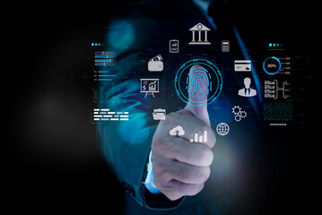 Digital thumb fingerprint scanner provides cyber security access with biometrics identification. Cybersecurity and privacy concepts. Businessman protecting personal data on virtual screen interfaces