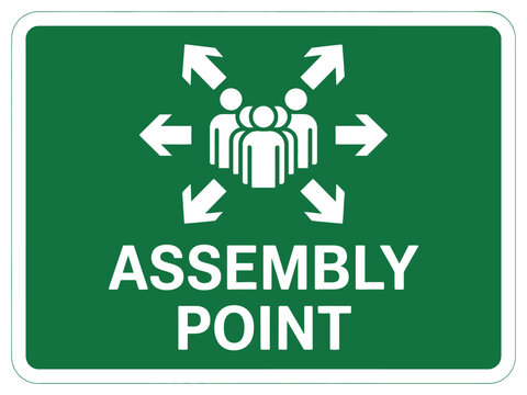 An assembly point sign indicates a designated safe meeting place in case of emergency.