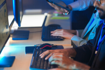 Cyber defenders race against time hands fly keyboard analyze threat data respond instantly command center active intense vigilance protects network now secure future build shield up protect now.