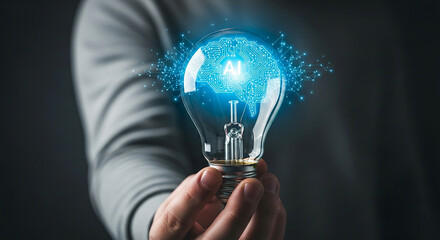 A person holds a glowing incandescent light bulb illuminated by a bright blue digital network symbolizing innovation creativity and new ideas