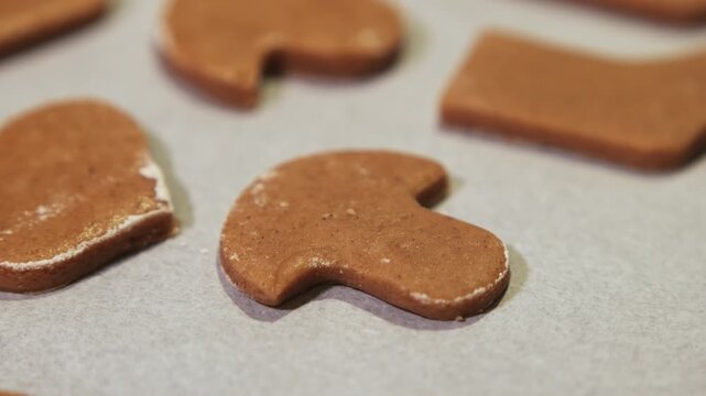 Close-up of baked gingerbread cookies on a baking sheet