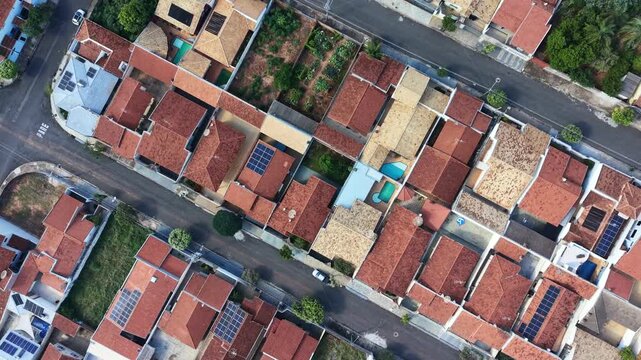 Aerial view showing rooftops and streets in a residential neighborhood area