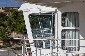 Calm Sea View From A Boat Deck Over A Tranquil Coastal Landscape