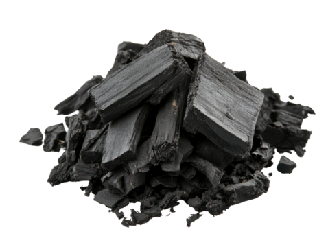 Pile of natural charcoal pieces isolated