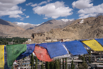 Leh, India - September 12, 2024: View of the city with Leh Palace and with snow capped mountains in the background