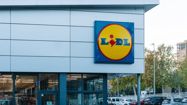 Lidl supermarket exterior with large logo displayed on building facade in city