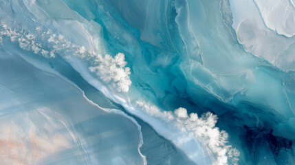 Frozen lake with swirling blue, teal and white pattern. Frost  and snow covered trees. Abstract winter background