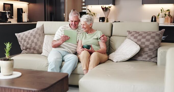 Old couple, kiss and tablet with drink for social media, streaming or subscription in living room. Elderly man, woman and tech with movie or videos together for retirement, bonding and hug with tea