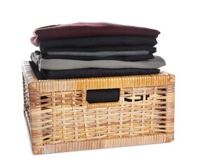 Laundry basket with clean clothes isolated on white