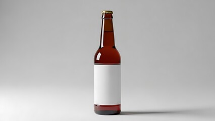 Full brown glass beer bottle with blank white label isolated.