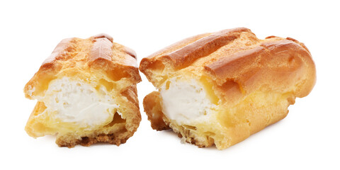 Halves of tasty eclair with whipped cream isolated on white