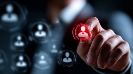 Hand selecting one illuminated red user icon from gray icons defocused background personnel choice visualization candidate identification display hiring selection symbolism