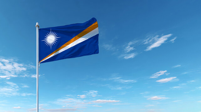 Marshall Islands flag waving proudly against a clear sky representing sovereignty and identity