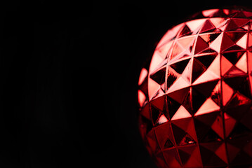 Christmas ornaments, beautiful details of Christmas ornaments seen through a macro lens, black background, selective focus.