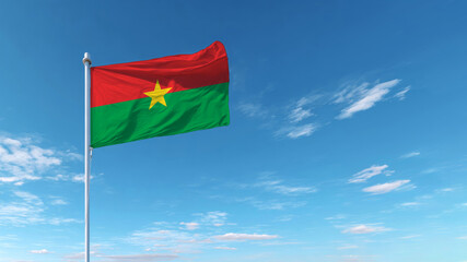 Celebrating Independence Day with the vibrant flag of Burkina Faso against a clear blue sky