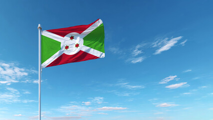 Burundi flag waving proudly against a clear blue sky on Independence Day celebration