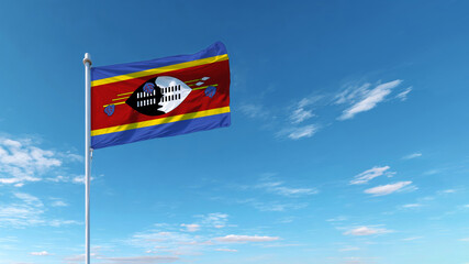 Celebrating independence with the national flag of Eswatini against a clear, blue sky