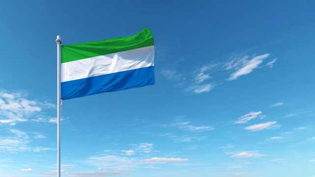 Celebrating Independence Day with the flag of Sierra Leone waving against a clear blue sky - Powered by Adobe