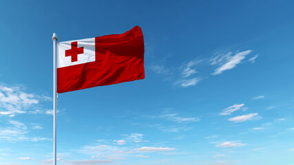 Celebrating independence day and sovereignty with the flag of tonga under a clear blue sky