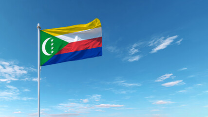 Comoros flag waving in the blue sky symbolizing independence and sovereignty of the nation