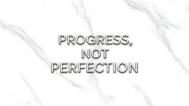 Progress not perfection text on a white marble textured background with soft shadows and highlights