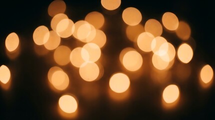Obraz premium Soft Focus Golden Bokeh Lights on Dark Background orange
