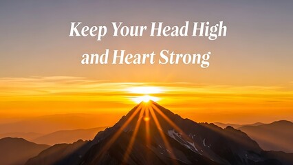 Vibrant sunrise over mountain peak with sun rays shining through the sky in the morning light