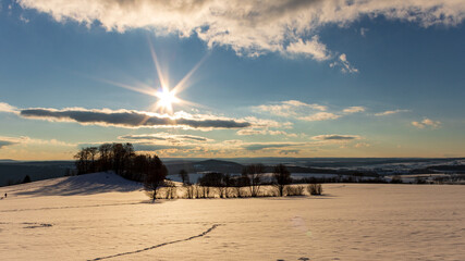Winter Sunset over Snowy Landscape with Trees, Rh&ouml;n Mountains, Germany
