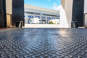 Truck unloading door in logistics warehouse polygon for large tonnage trucks.