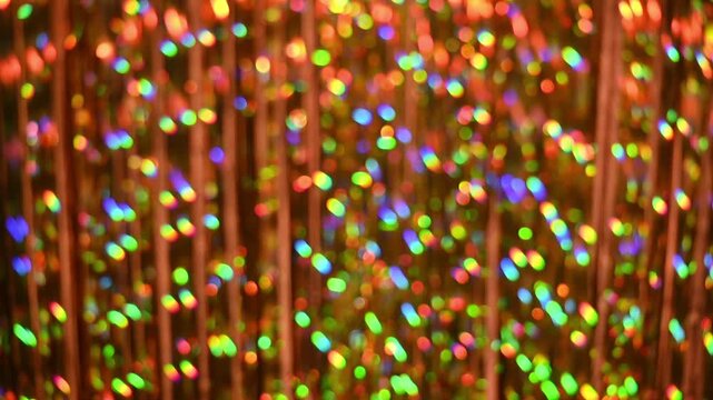 abstract texture glows with rainbow colors in continuous gentle motion. Multicolor background creates artistic composition with shimmering light particles.abstract pattern for digital designs, visuals