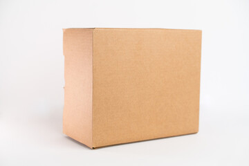 Mock-up of cardboard box, product and paracel packaging isolated on White background. Horizontal orientation.