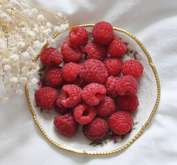 fresh raspberries on a plate