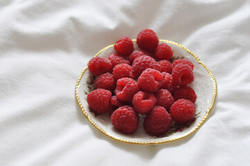 fresh raspberries on a plate