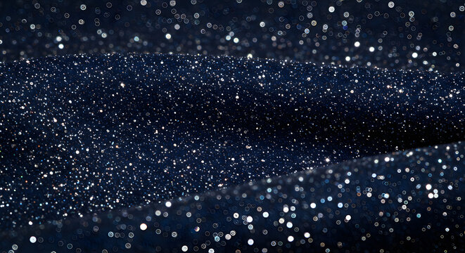 A captivating closeup of a dark blue glitter fabric, shimmering with countless tiny white particles, creating a luxurious and festive abstract background texture