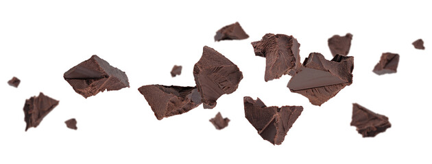 Chunks of crushed dark chocolate fly and levitate in space. Isolated on white.