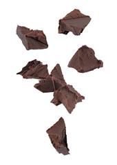 Chunks of crushed dark chocolate fall through space. Isolated on white.