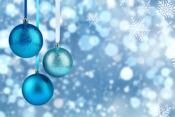 Fototapeta premium Merry Christmas and Happy Holidays card with festive balls, snowflakes and bokeh lights