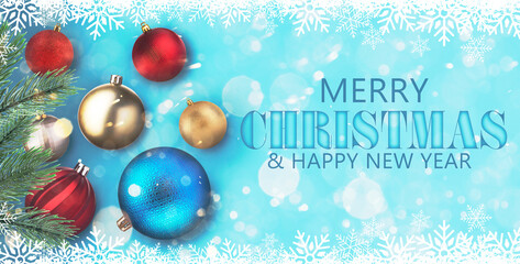 Merry Christmas and Happy New Year card. Festive balls, fir tree branches and snowflakes on blue background with bokeh lights
