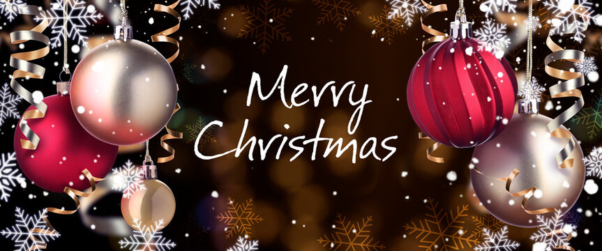 Merry Christmas and Happy Holidays card. Festive balls, streamers and snowflakes on dark background with bokeh lights