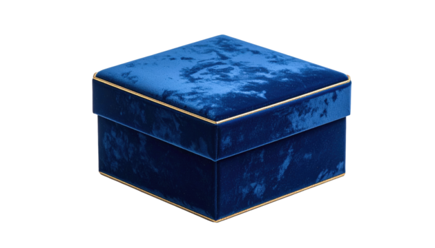 A square, velvet box with a gold trim around the top edges sits centered on a black background, conveying elegance