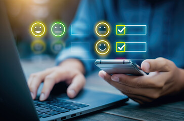 Customer provides positive feedback ratings using smartphone alongside laptop displaying satisfaction survey.