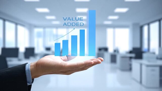 Value Added: Hand Holding Growing Business Chart in Office