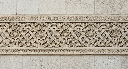 Ornate stone wall frieze with intricate floral and geometric patterns