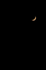 Crescent Moon In Dark Night Sky