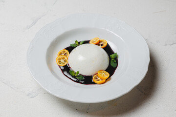 Gourmet Panna Cotta with Kumquat and Berry Coulis