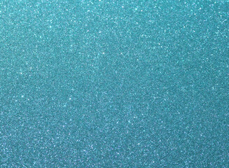 Blue sparkle background. Pastel blue glitter background. Blue glimmer. Twinkle texture. Glitter surface. Glimmer layout. Celebration layout. Diamond luxury surface. Turquoise holiday background.