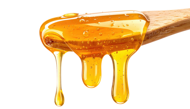 Close-up of golden, viscous liquid dripping from a wooden utensil. Bubbles are visible within the translucent substance. Isolated
