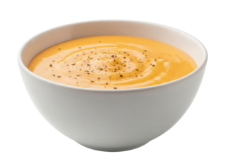Creamy butternut squash soup in a bowl isolated PNG, delicious autumn meal on transparent background for food blogs and restaurant menus