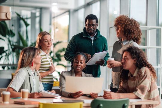 Diverse business team collaborating during office meeting